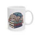 Tired Bunny on Textbooks Ceramic Mug — Sleepy Booklover Coffee Cup (11oz, 15oz)